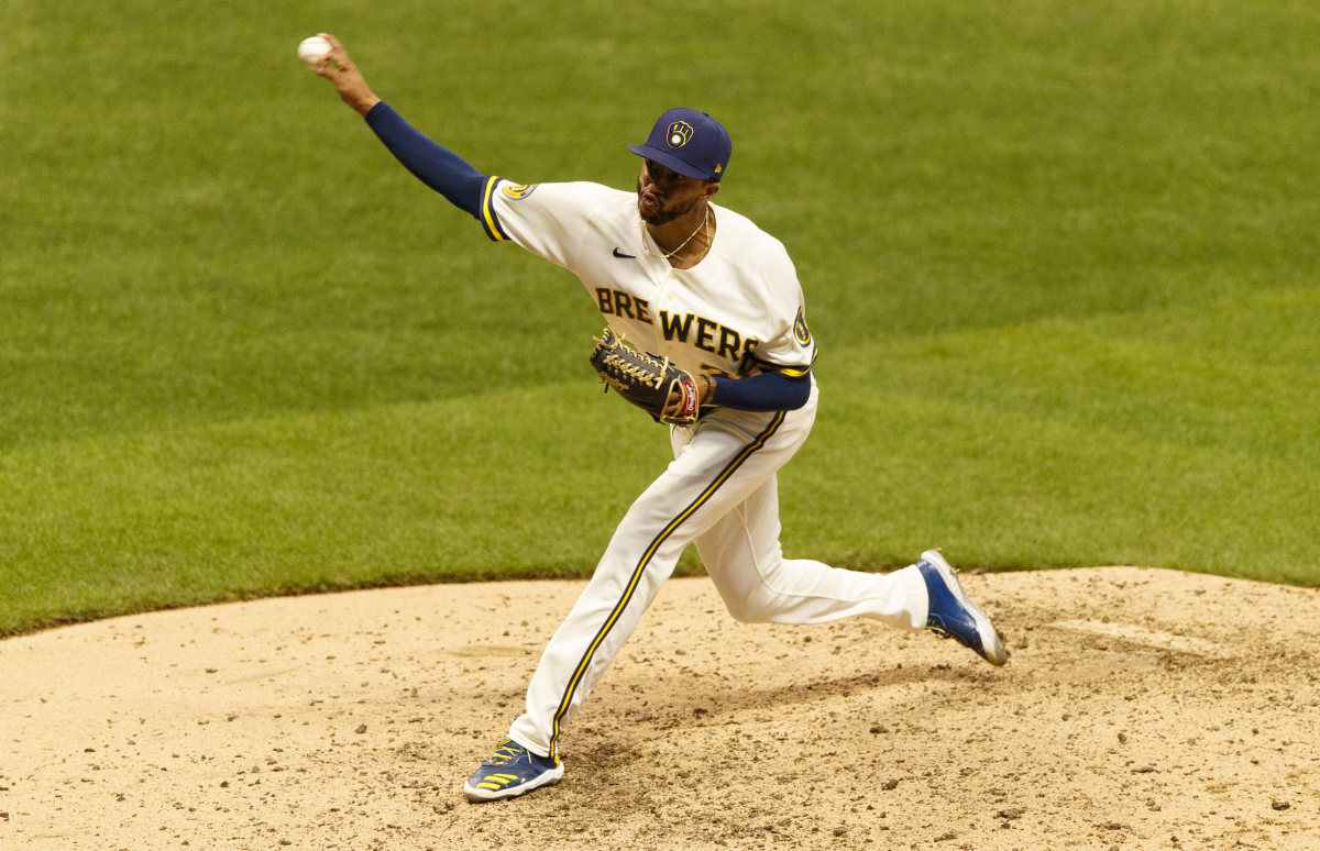 Milwaukee Brewers pitcher Devin Williams (38) throws a pitch during the eighth inning against the Cincinnati Reds at Miller Park.